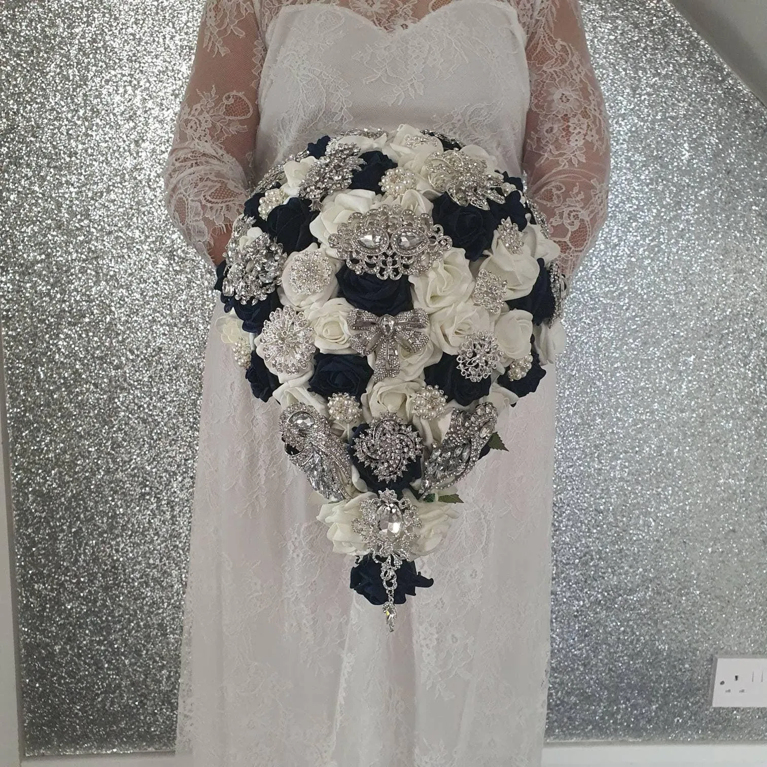 Navy brooch bouquet with artifical foam roses by Crystal wedding uk