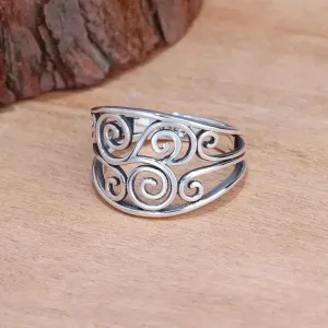 Silver Celtic ring with curling vine design